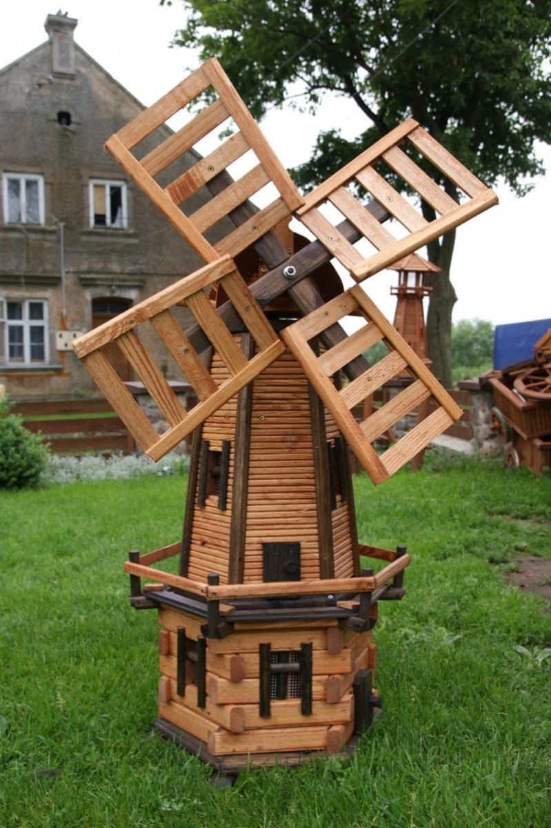 Декоративные деревянные мельницы в саду: красота, функциональность и особенности