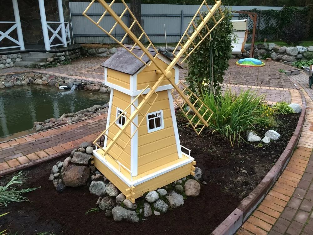 Декоративные деревянные мельницы в саду: красота, функциональность и особенности